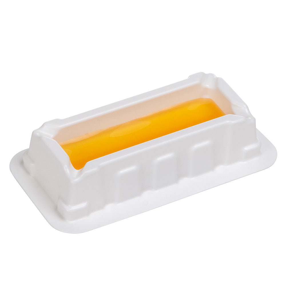 White plastic 10mL disposable reagent reservoir filled with yellow liquid, angled view.