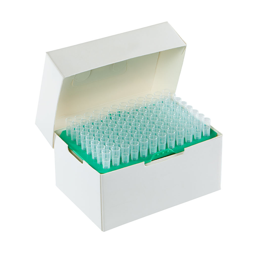 A white cardboard box with an open lid contains a green rack of 96 clear pipette tips.