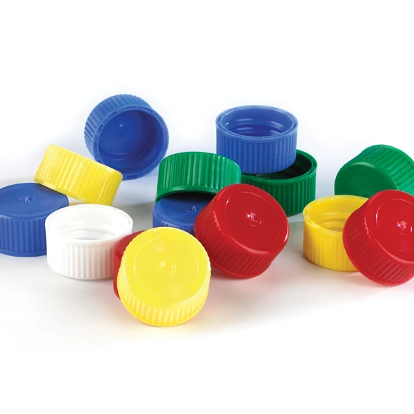Plastic screw caps in assorted colors including yellow, blue, red, green, and white.