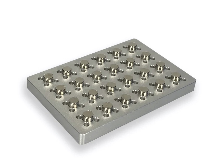 Anodized aluminum 4E's magnetic bead separation rack viewed from an elevated angle, showing rows of cylindrical magnets.