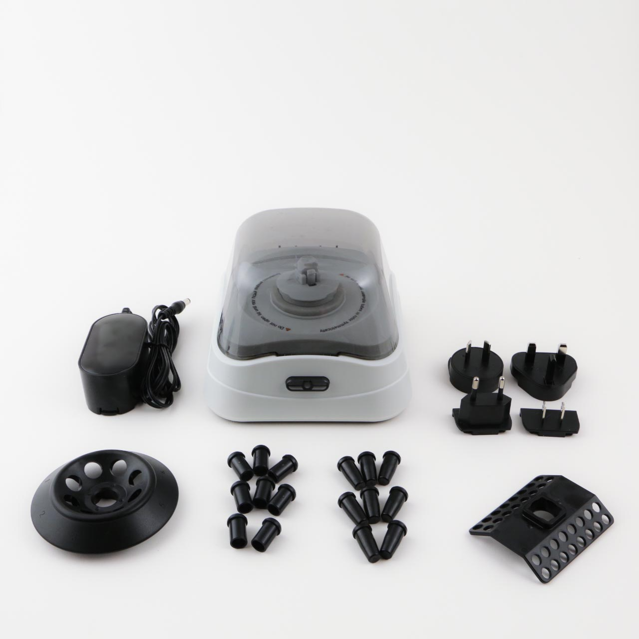 Labnet mini microcentrifuge with power adapter, interchangeable rotors, tube adapters, and plug adapters.