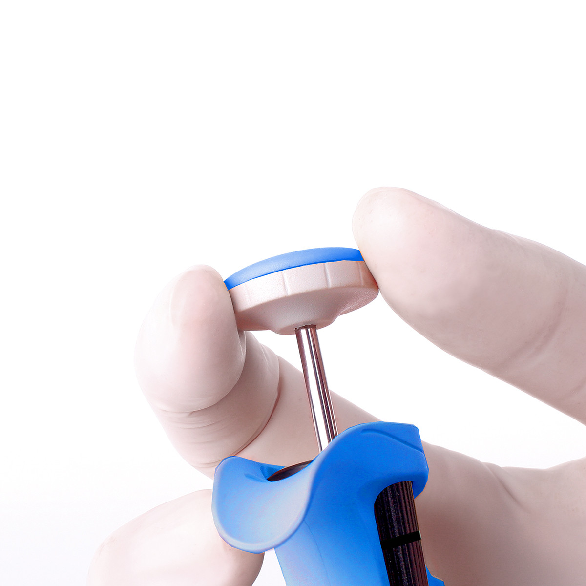 Gloved hand adjusting blue push-button on Labnet BioPette Plus single-channel pipettor.