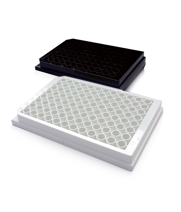 White and black 96-well microplates angled on a reflective black surface.
