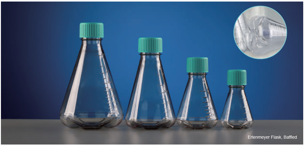 Four clear plastic Erlenmeyer flasks with teal screw caps and volume scales, lined up on a gray surface against a blue