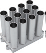 Silver aluminum thermal mixing block with twelve vertical tube wells, angled overhead view.