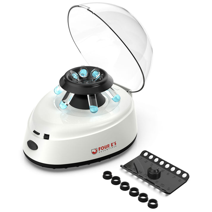 White 4E's mini centrifuge with open clear lid, loaded rotor, extra PCR rotor, and tube adapters.