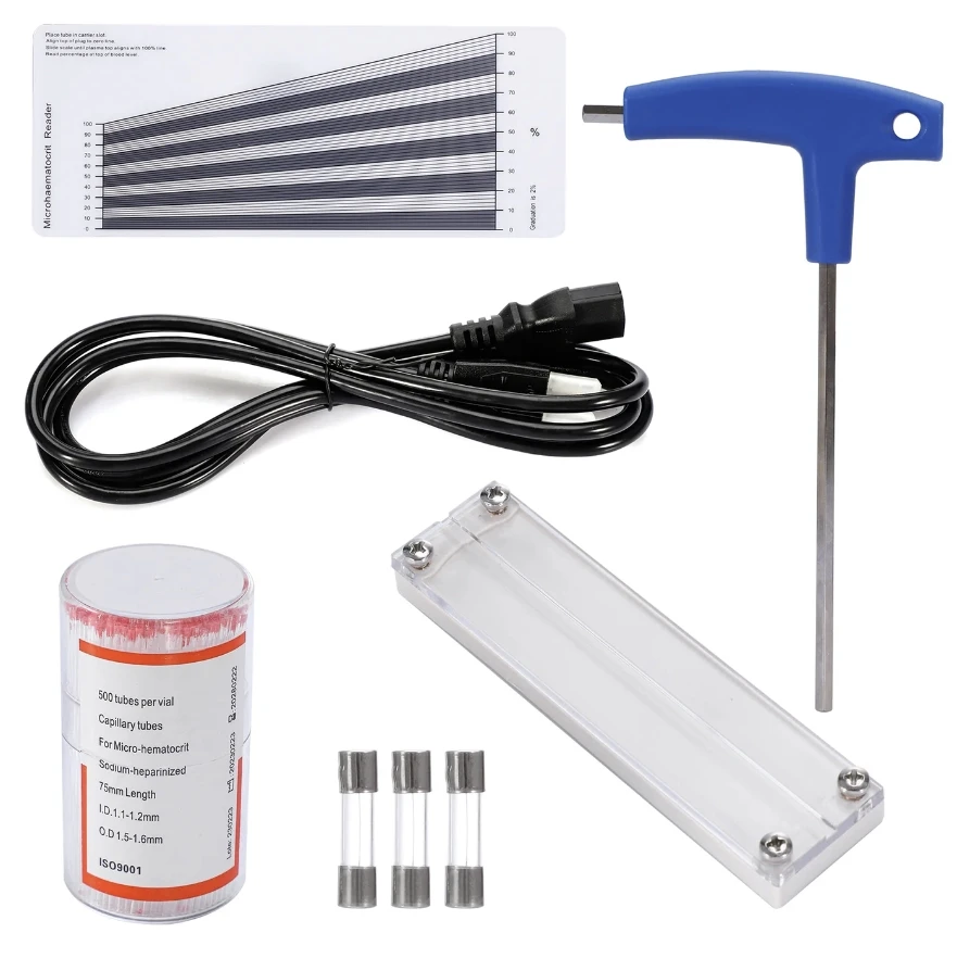 A microhaematocrit reader, blue T-handle hex wrench, power cord, capillary tubes vial, three fuses, and a clear plastic tray.