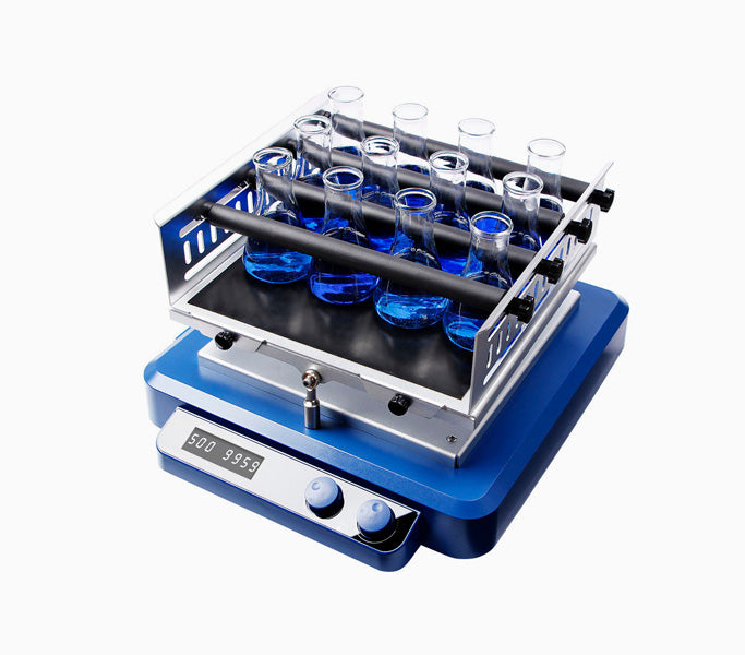 Blue LED digital 3D laboratory shaker holding multiple Erlenmeyer flasks with blue liquid.