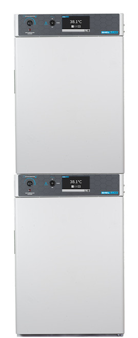 Dual-stacked white laboratory incubators with dark gray control panels and touch screen displays.