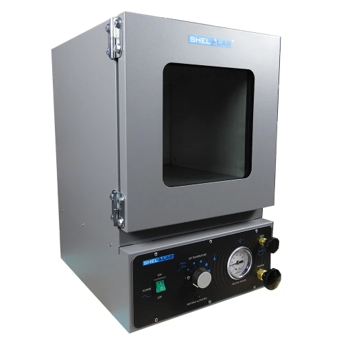 Gray Shel Lab economy vacuum oven viewed from an angle, featuring a front door window, power switch, and temperature