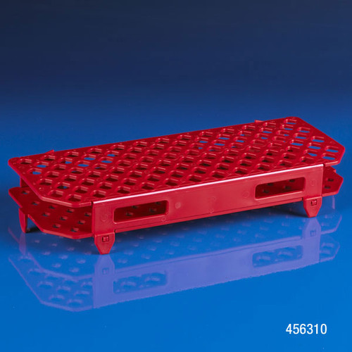 Red plastic 100-place microcentrifuge tube rack viewed from a low angle.