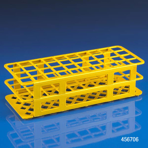 Yellow plastic snap-together 40-place tube rack angled on a reflective blue surface.