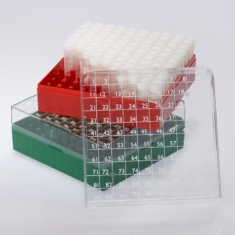 Red polycarbonate 100-place cryo box filled with white vials, beside a green box and transparent numbered lid.
