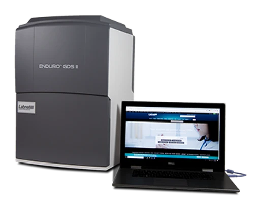Labnet Enduro GDS II gel documentation system in gray and white next to a laptop.