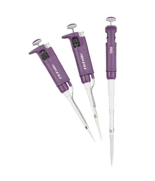 Three purple and white Labnet BioPette A single-channel pipettors with tips, angled against a black background.