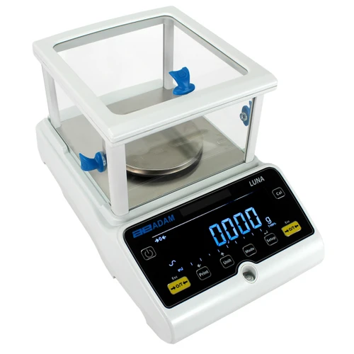 Adam Equipment Luna precision balance in white with a glass draft shield and blue backlit LCD screen.