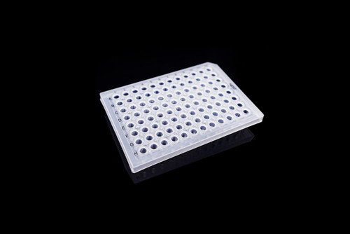 Clear 96-well semi-skirted PCR plate angled on a black background, showing rows A-H.