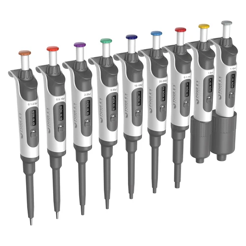 Nine 4E's single-channel adjustable pipettes in various color-coded volumes, arranged diagonally.