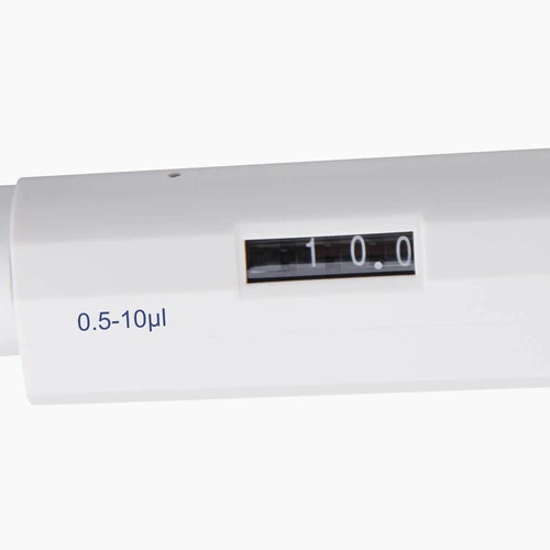 Close-up of a white Four E's 0.5-10uL pipette displaying 10.0 on its digital volume counter.