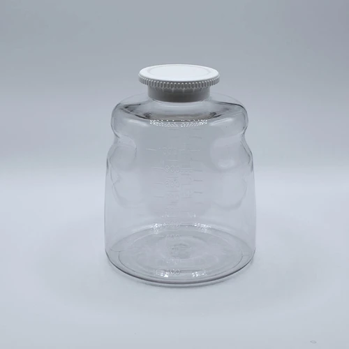 Clear polystyrene 1000mL round media storage bottle with a white easy grip cap.