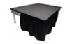 Top rated 8" High Black Shirred Pleat Wyndham Flame Retardant Polyester Stage Skirting with the Loop Side Fastener - Attached easily via the Velcro on back of the skirting.