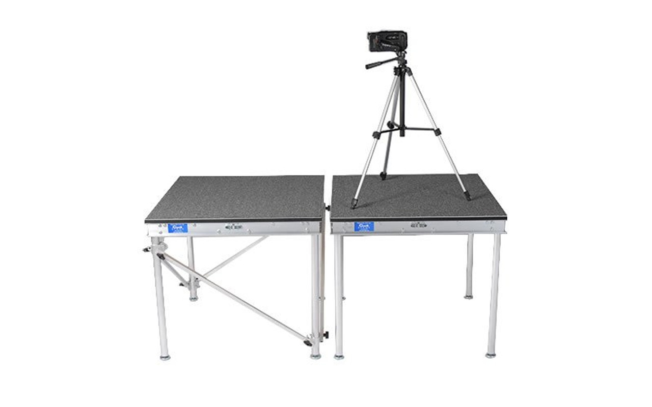 Pair of Quik Stage 4' x 4' x 24" High Camera Platform Side by Side. One Riser with Diagonal Cross Braces and One for Camera Operator.