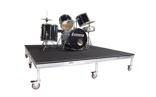 Top rated Quik Stage 7' x 7' High Rolling Drum Riser Package with Black Polyvinyl Surface - Angled view with drum set