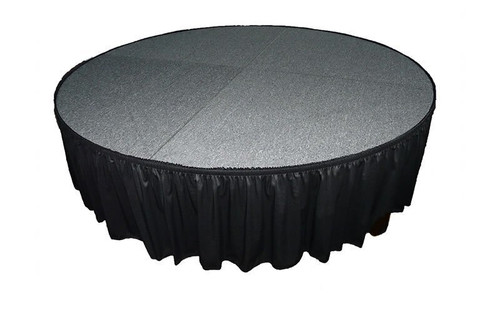Top rated 8" High Black Shirred Pleat Wyndham Flame Retardant Polyester Stage Skirting with the Loop Side Fastener - Attached to a round stage.