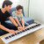 88 Key Foldable Electric Keyboard Piano with Wireless MIDI and Dual Speakers-White - Color: White