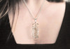 Fulgurite lightning sand jewelry Ice wire wrapped in 925 sterling silver, with a chain on a model, Sciencemall-USA Fulgurite lightning sand jewelry Ice wire wrapped in 925 sterling silver, with a chain on a model, Sciencemall-USA