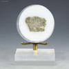 Green trinitite with inclusions, Specimen ID84592 facing front on a display stand, Sciencemall-USA