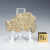 Trinitite atomic glass 6.3 grams, back-facing on a display stand, for sale at Sciencemall-USA