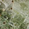 macro photograph 5×, showing complex, a matrix of olive-green glass fractured by thermal shock, atomic bubbles, black, red, Sciencemall