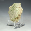 Side-facing green black Trinitite, 14.7 grams on a display stand, for sale at Sciencemall-USA