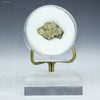 Green Trinitite front view, specimen ID 59685 - 1.7 grams on a display stand, Sciencemall-USA