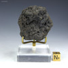 Complete manganese nodule, 129 grams, displayed back-facing on a plexiglass stand, available at Sciencemall-USA.