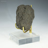 Side view of manganese nodule 101 grams on a plexiglass riser, for sale at Sciencemall-USA