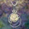 Sterling silver mammoth rose jewelry shown on a dark flowery background, Sciencemall-USA Sterling silver mammoth rose jewelry shown on a dark flowery background, Sciencemall-USA