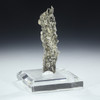 Skeleton key, dynamically shaped fulgurite shown tilted right on a clear plexiglass riser.