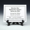 Marble Bar Spherule Bed large description tag on a stand.