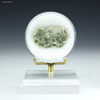 Trinitite specimen ID: 77947,4.3 grams, facing front on a display stand, Sciencemall-USA