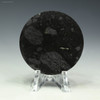 Murowa kimberlite disc from Zimbabwe, 34g, back-facing on a display stand at Sciencemall-USA