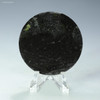 Murowa kimberlite disc from Zimbabwe, 36g, back-facing on a display stand at Sciencemall-USA