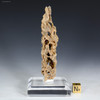 Back-facing "Fire and Flames" fulgurite on a plexiglass riser, for sale at Sciencemall