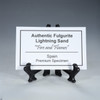 Fulgurite "Fire and Flames" description tag on a stand, Sciencemall