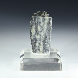 Isua Greenstone Belt 23.9 gram specimen [92175] shown front on a plexiglass riser.