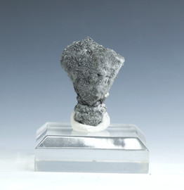 Cannizzarite mineral from La Fossa Crater, Volcanic Fumarole, Italy, on a display stand.