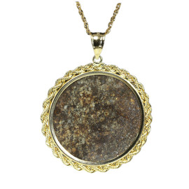 Stony chondrite meteorite jewelry 14k gold NWA869 cut, polished and shown in a rope coin mount pendant with chain on a white background.