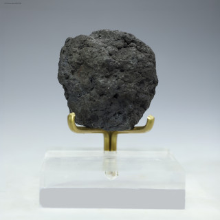 Manganese nodule 48.7 grams, facing front on a plexiglass riser, at Sciencemall-USA