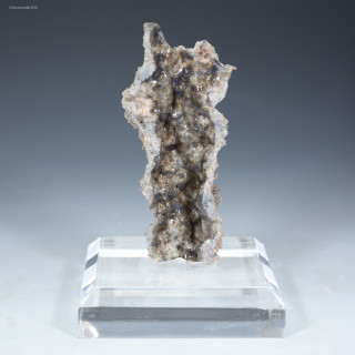 Front-facing fulgurite Icarus lightning sand on a plexiglass riser, for sale at Sciencemall-USA